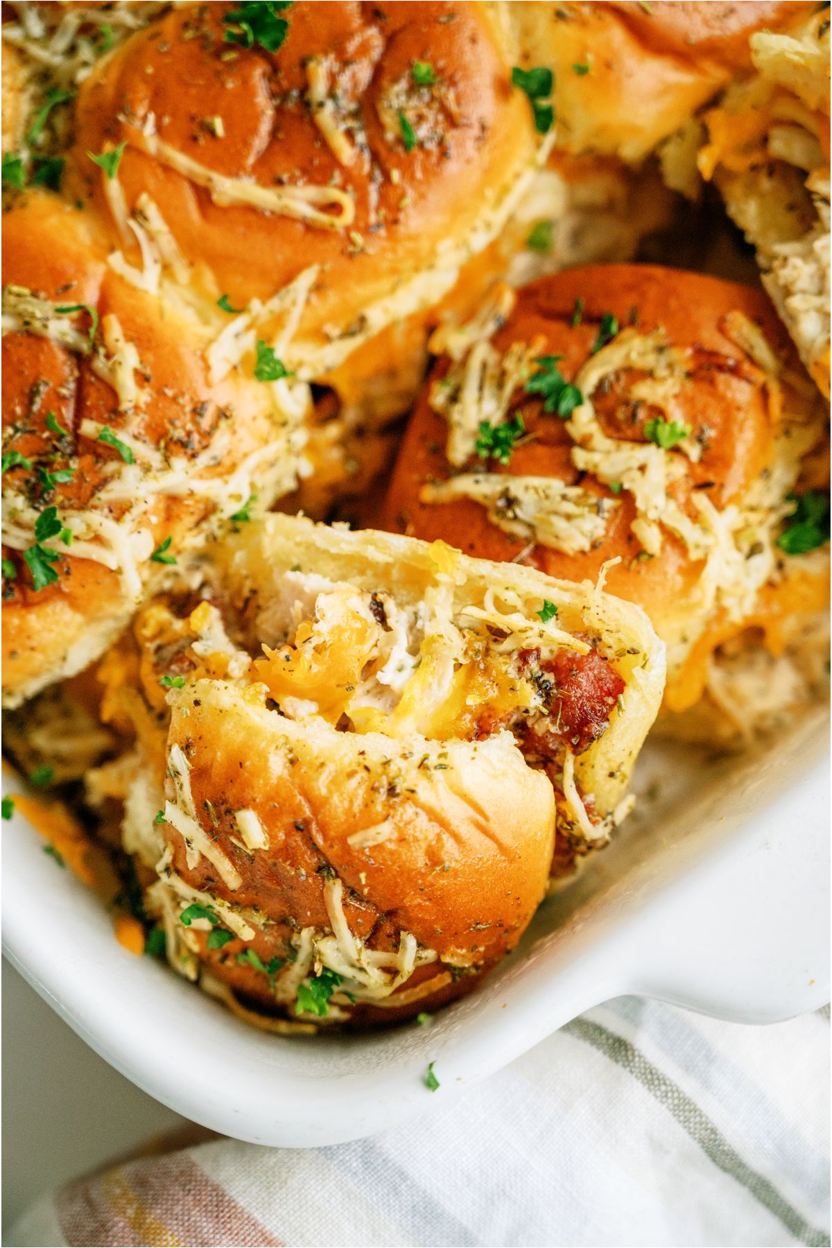 Individual Crack Chicken Slider in a baking dish.