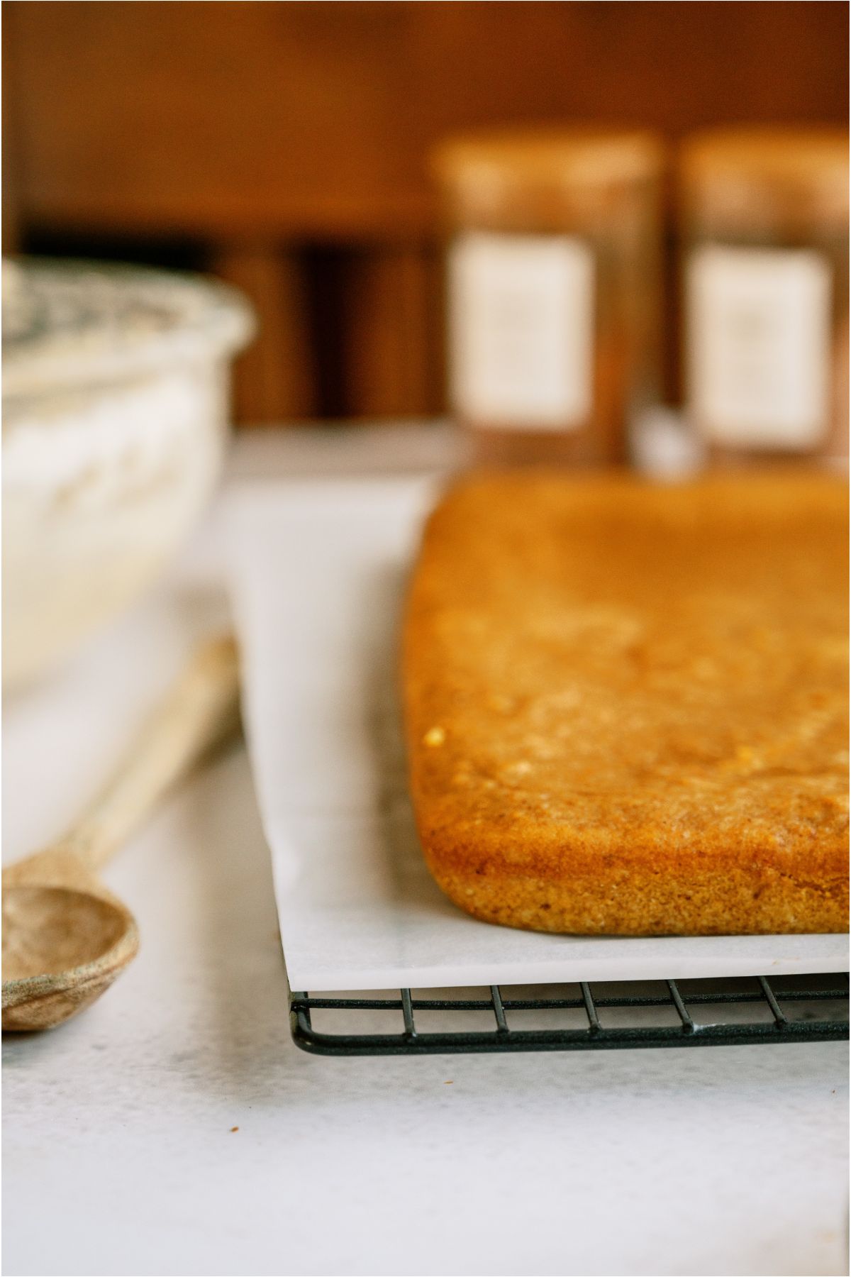 Pumpkin Bars base without frosting on a parchment covered cooling rack.