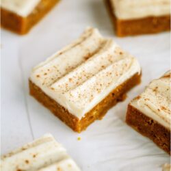 Square Pumpkin Bars with cream cheese frosting.