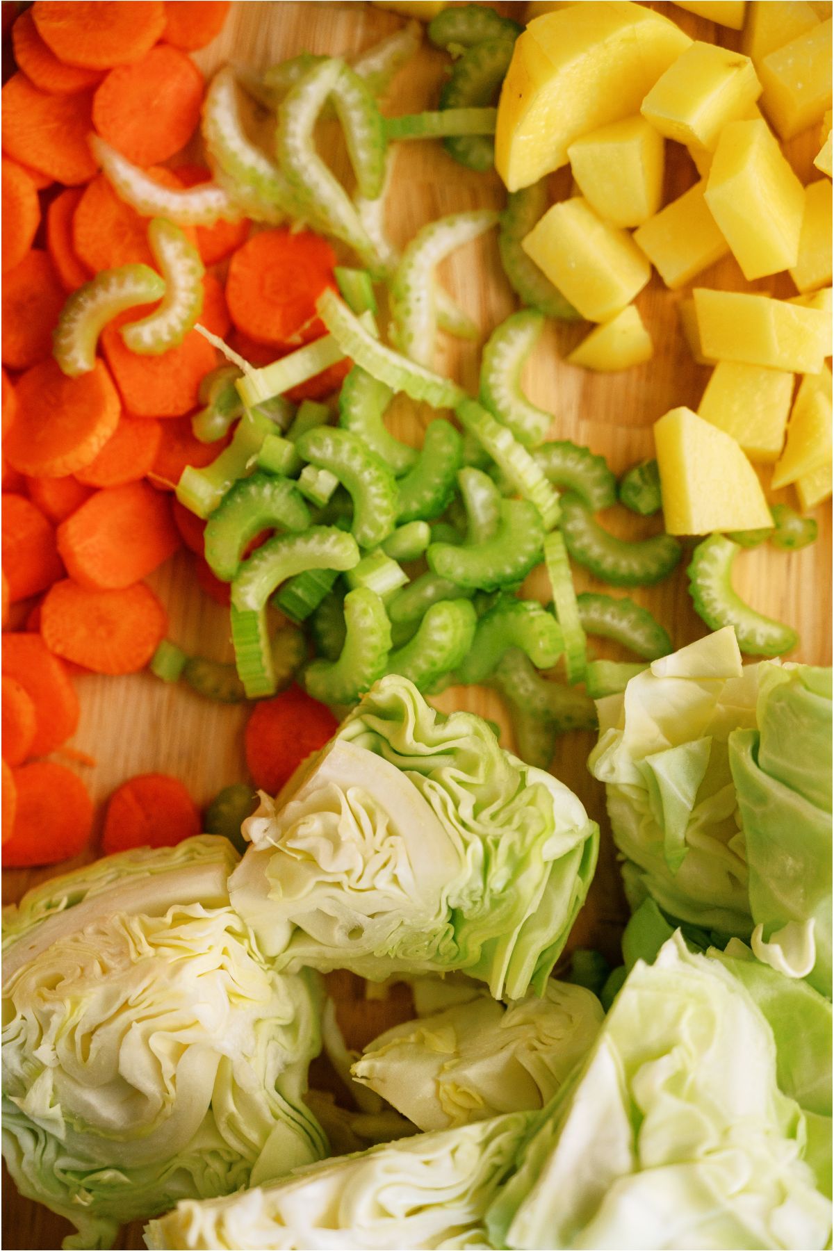 Vegetable chopped up on a cutting board.