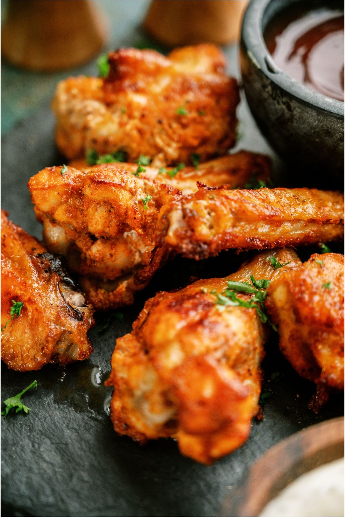 Close up of 4 Crispy Baked Chicken Wings.