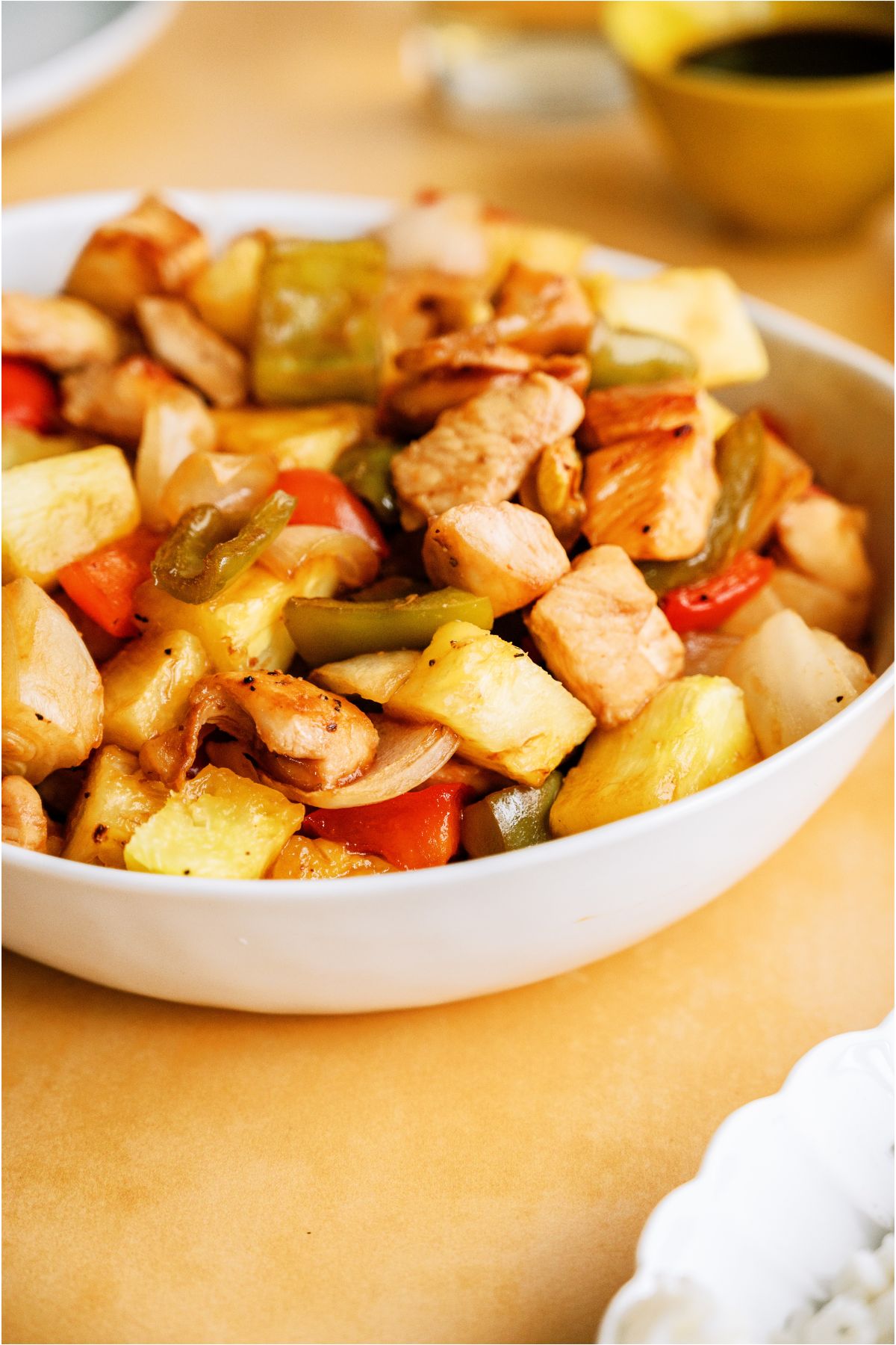 Sheet Pan Hawaiian Chicken in a white serving bowl.