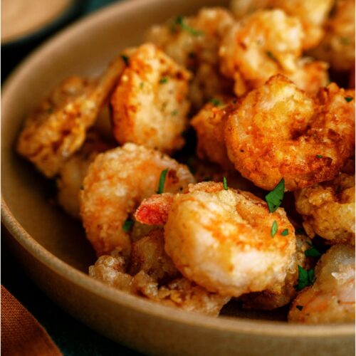 A bowl filled with homemade fried Bang Bang Shrimp.