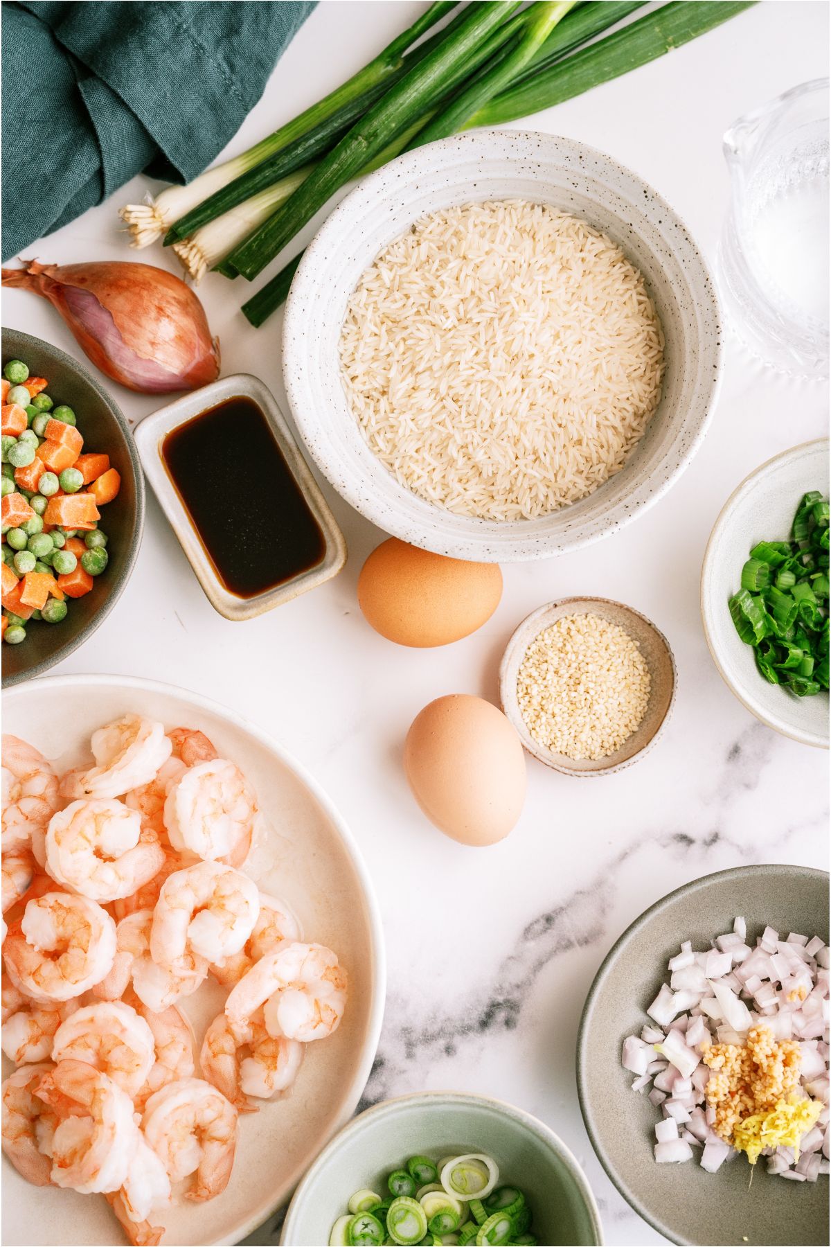 Ingredients needed to make Shrimp Fried Rice.